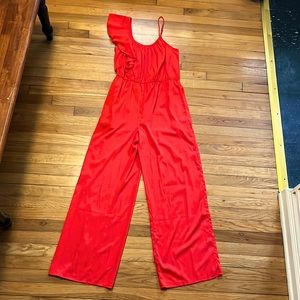 Red ruffle one shoulder wide leg jumpsuit